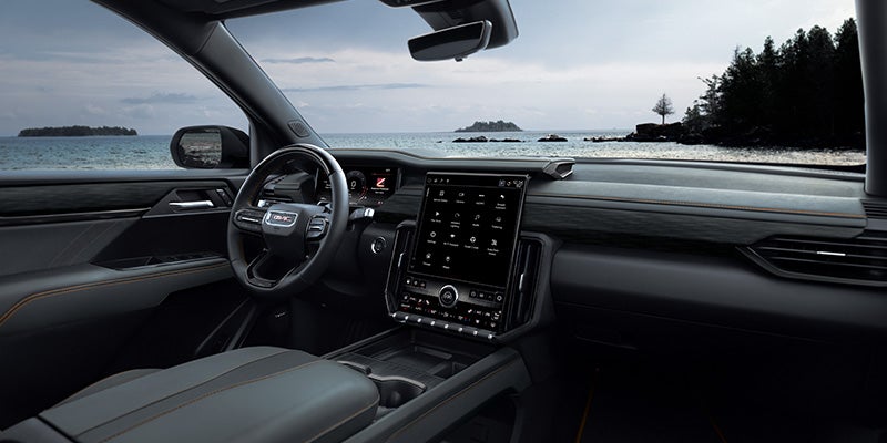 2027 GMC Acadia interior cabin and 15-inch touchscreen